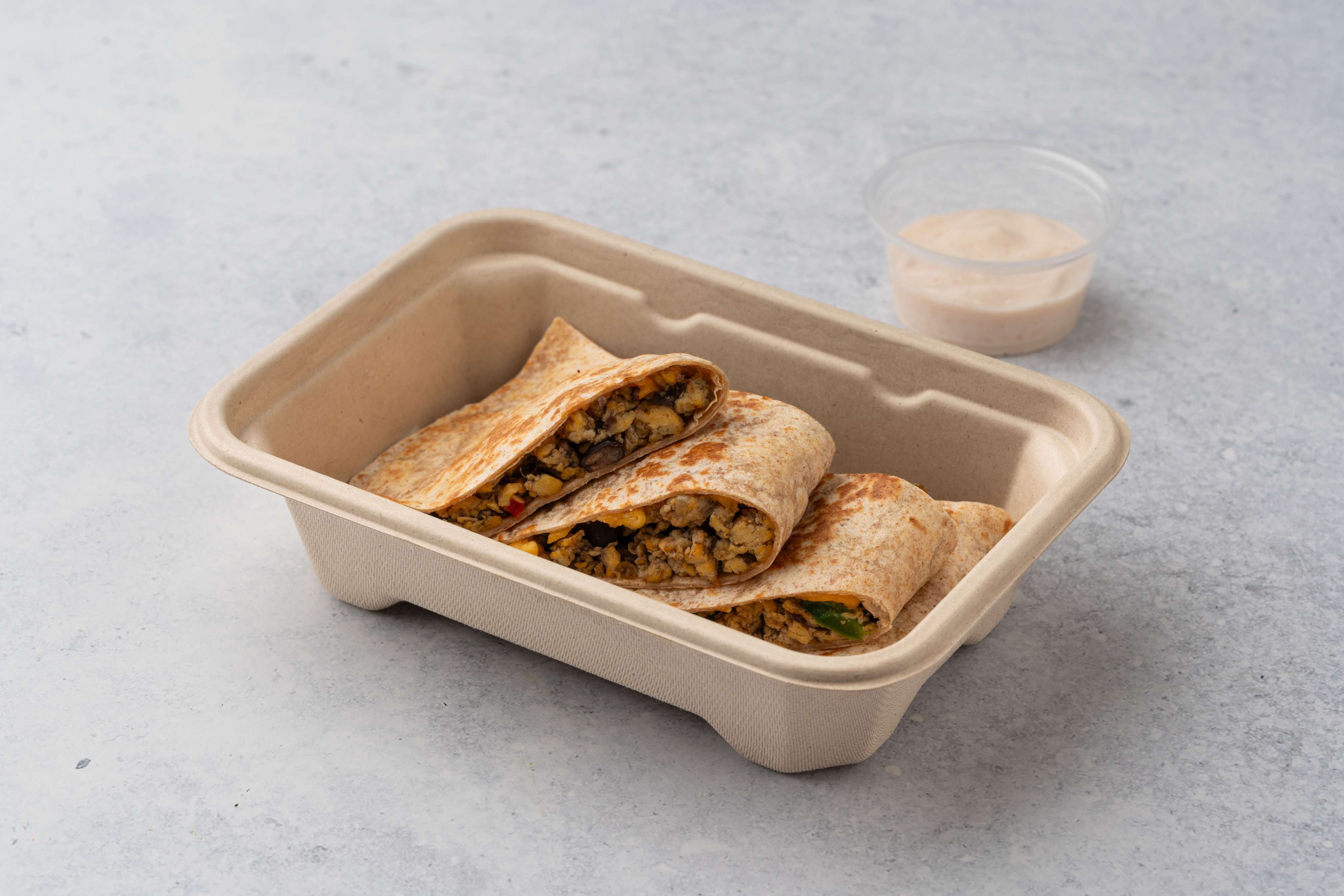 Scrambled Egg Quesadilla With Black Beans And Cabsicum Served With Paprika Yogurt Sauce